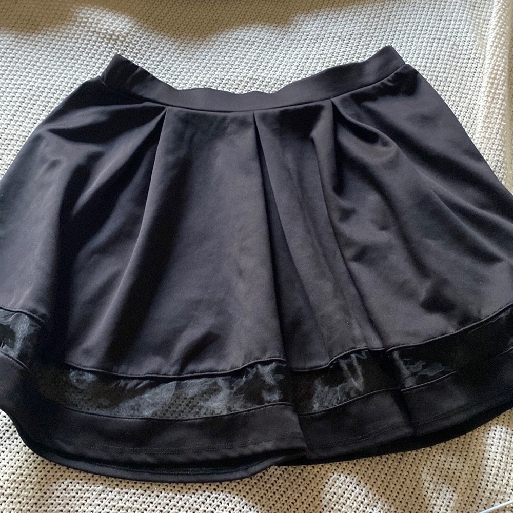 Black skirt with mesh area